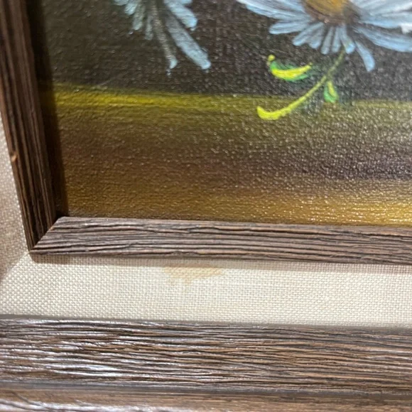 Original oil painting of daisies in a vase signed by the artist Nancy Lee